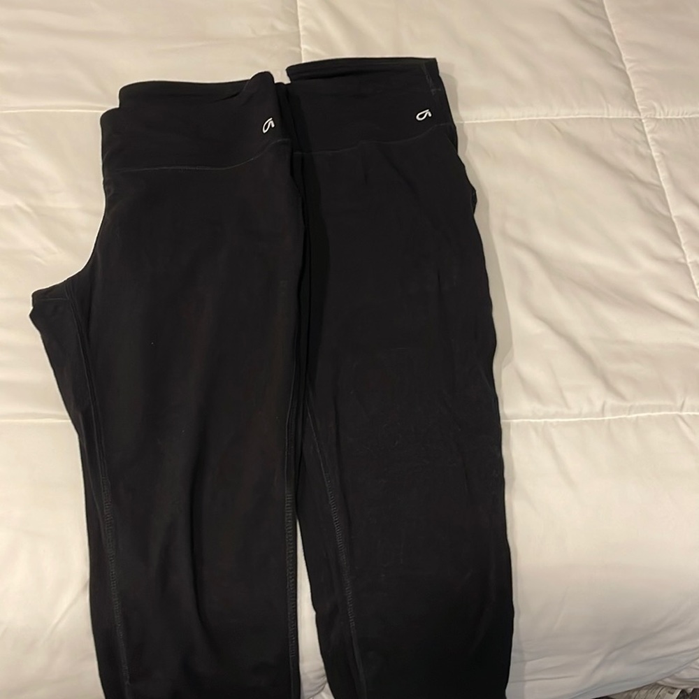 Two pairs of Gapfit black capri leggings size medium